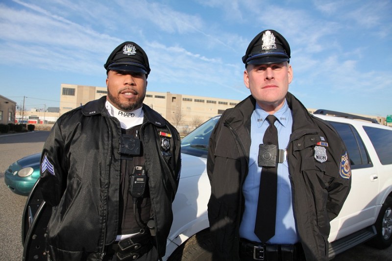 Sgt. Shayne Smith (left) and Officer Thomas Horner wear the body cameras in use by the Philadelphia Housing Authority Police Department.