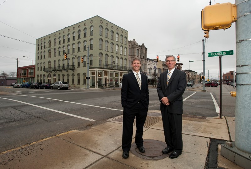 Duane Miller (left) of Flaherty & Collins Properties and Mark Lindenlaub of Thrive Alliance turned four buildings in downtown Greensburg, Ind., into housing for seniors. (Jennifer Cecil)