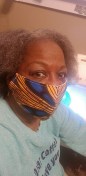 Jeliner Jordan wears one of the 250 masks she has made since the onset of COVID-19