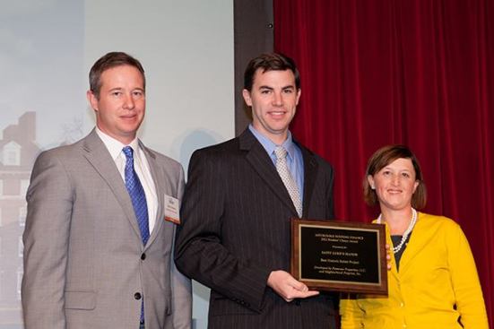 The best historic rehab honor goes to Saint Luke’s Manor in Cleveland, developed by Pennrose Properties, LLC, and Neighborhood Progress, Inc. Pictured are Ryan Bailey (center), a Pennrose development officer; Sean Thomas from the Ohio Housing Finance Agency; and Affordable Housing Finance Executive Editor Christine Serlin.