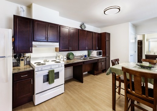 The units are all universally designed and feature adjustable-height countertops, pull-down shelves, and roll-in showers. Every unit is accessible and can be modified to serve residents' needs.