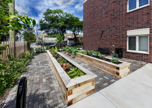 An accessible garden is available for residents' usage. One resident, who formerly had been in a nursing home and was referred to the property by the state, had been a landscaper and volunteers his time to help oversee and maintain the garden.