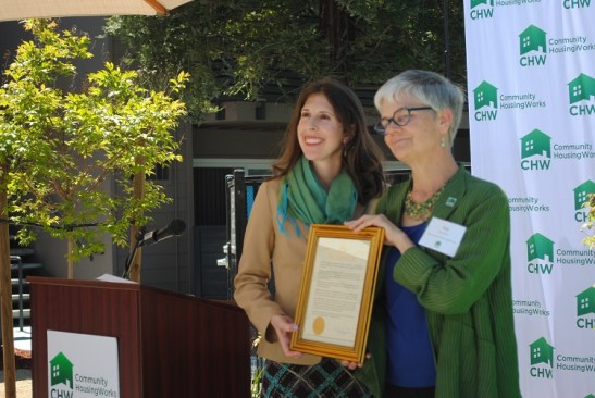 Carlyn Obringer, mayor of Concord, Calif., (left) recognizes Sue Reynolds, president and CEO of Community HousingWorks, at a ceremony celebrating the rehabilitation of Sun Ridge Apartments.