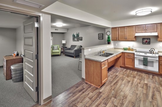 Designed by SWBR Architects, the development has one- and two-bedroom apartments that have open ﬂoor plans with high levels of visibility and strategic lighting to help residents.