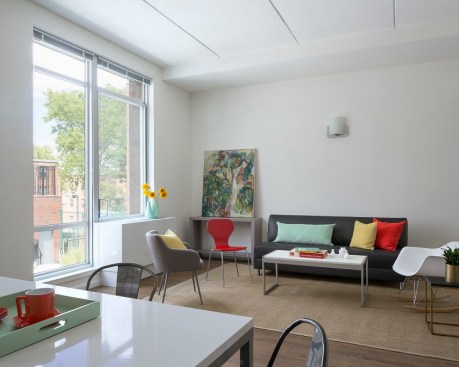 Schoolhouse Terrace contains 80 one-bedroom, 32 two-bedroom, and eight three-bedroom units, as well as an additional  unit for an on-site superintendent. Twenty-six units are for residents at or below 30% of area median income (AMI), 67 units are for residents at or below 50% of the AMI, and 27 units are for residents at or below 60% of AMI.