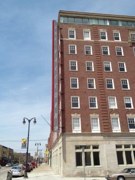 The eight-story Tallcorn is the tallest building in Marshalltown, Iowa, and holds a prominent location on Main Street. New commercial storefront space is on the first floor, and a historic ballroom is being restored to be leased as community and event space.
