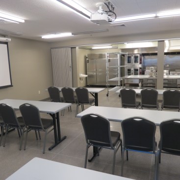 The development features a demonstration kitchen, where cooking classes help residents gain skills to live&nbsp;on their own and to work in the culinary industry.
