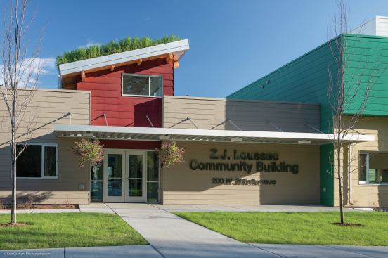 The Z.J. Loussac Community Building was designed as a "learning" building and features a sod roof, which provides an ecosystem that gives back to the environment. Solar panels also heat water for the building.