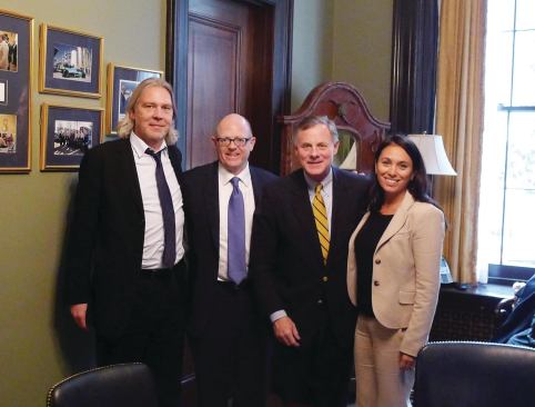 From left, Vitus Group team members Scott Langan, Stephen Whyte, and Makani Maeva meet with Sen. Richard Burr (R-N.C.) at his office in Washington, D.C. 